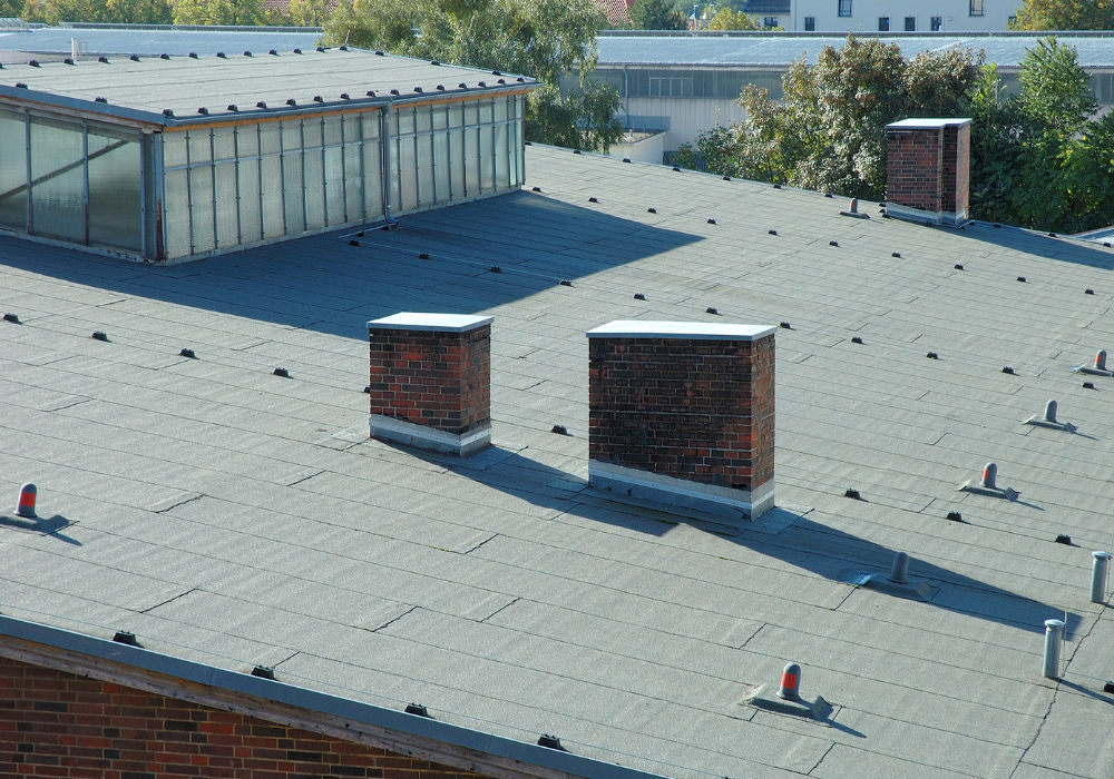 Commercial roofing services for warehouses and condominiums in Broward County, FL  RainShield Roofing
